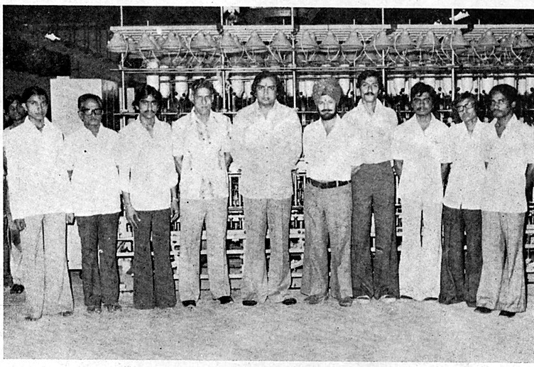 Officers and employees of the Company standing before the spinning frames at Ankleshwar, at the inauguration of the Spinning Project.